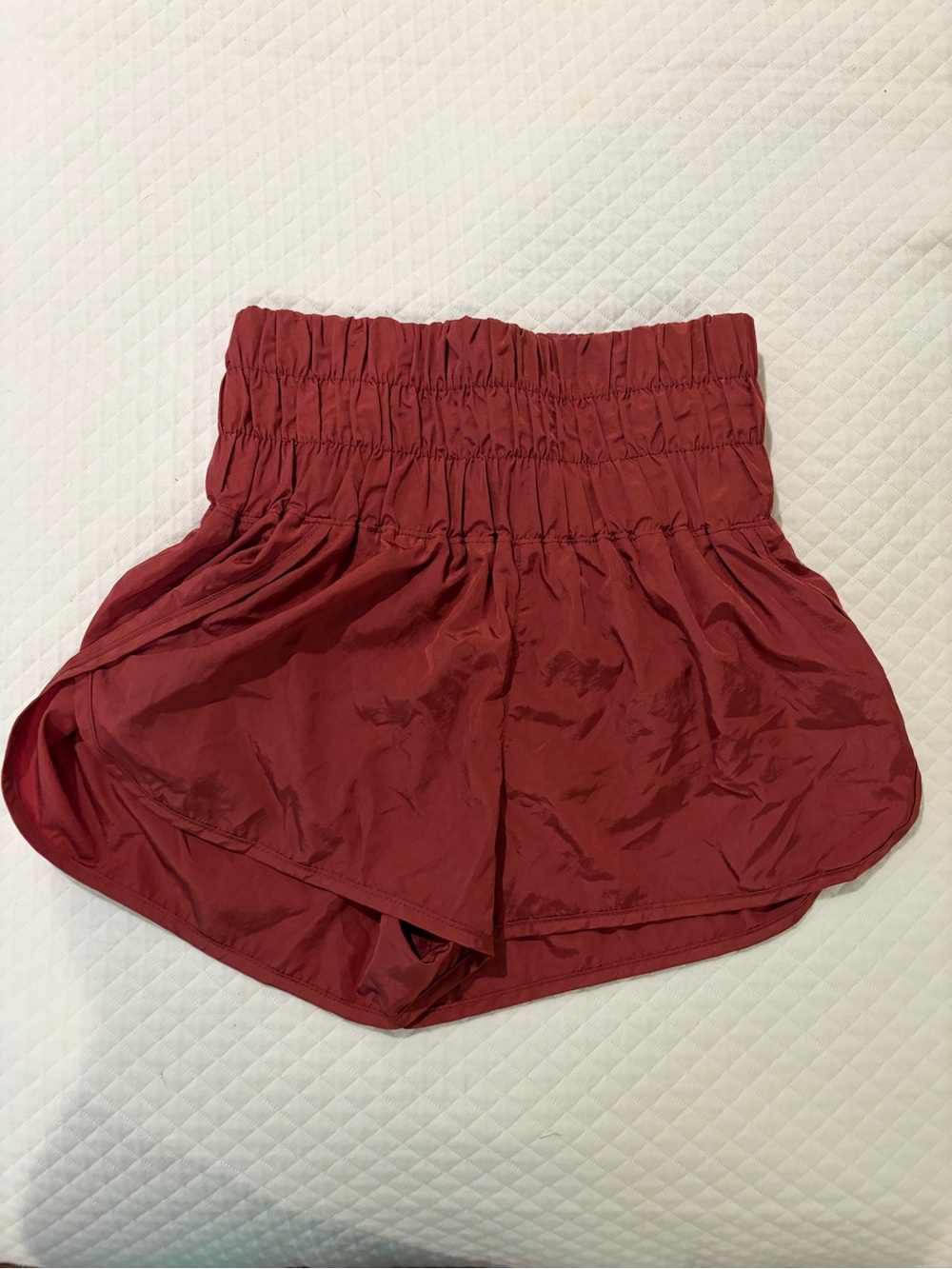 FP Movement by Free People High-Rise Smocked Athletic Shorts in Burgundy